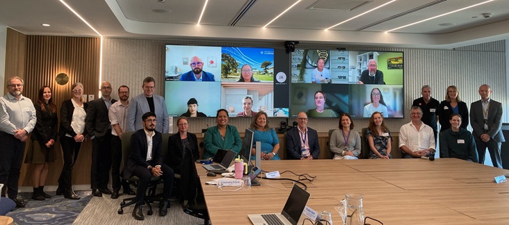 A group of people ion a meeting room